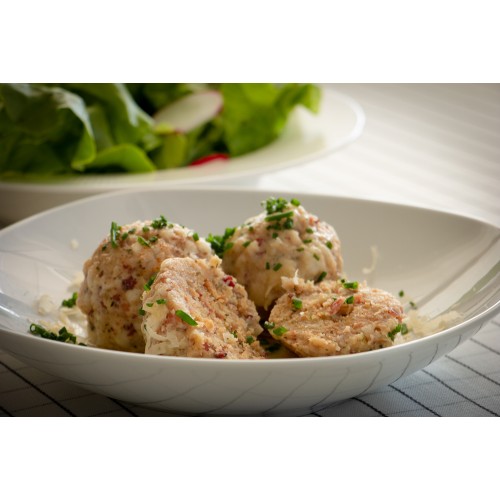 Canederli allo Speck con Parmigiano, burro fuso e erba cipollina