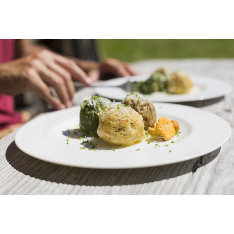 Tris di canederli al formaggio, allo speck e agli spinaci